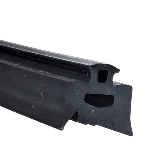 Close-up of a black plastic strip with a white background